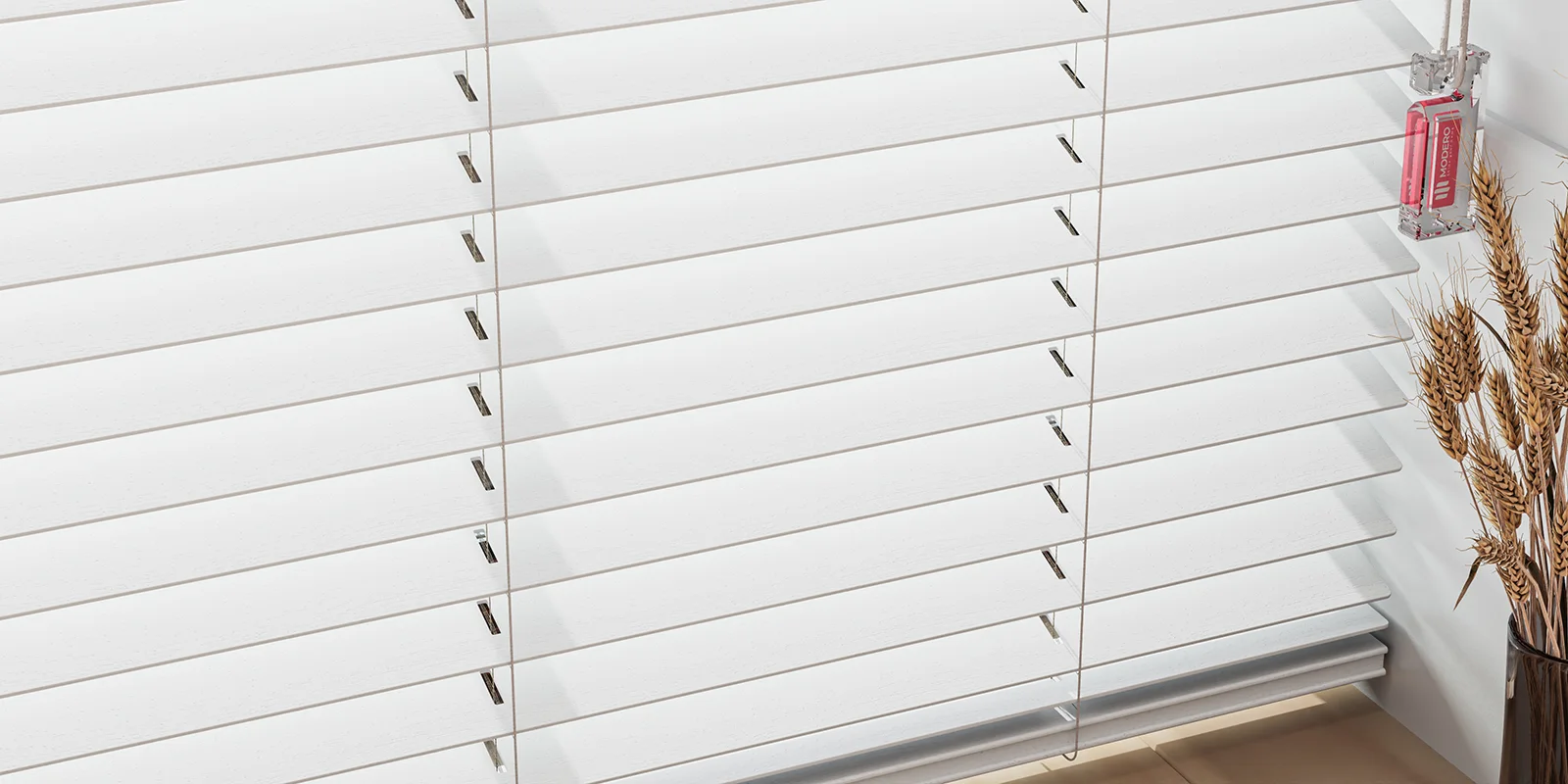 MODERO Faux Wood Blinds at the window.